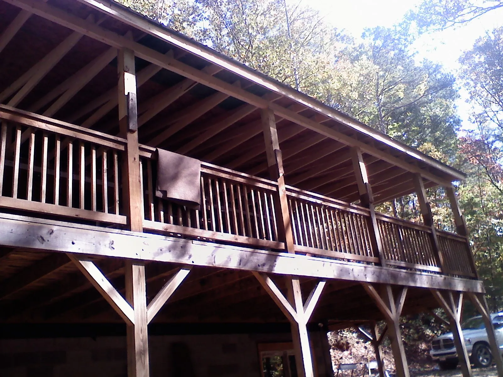 Timber framing under a new elevated porch and deck — Roof Leak Repair in Royal by Roofing Brothers